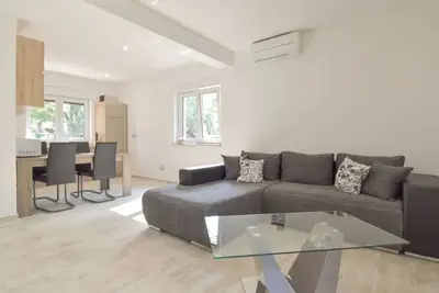 Image de Confortable appartement avec Wifi, piscine privée, climatisation, Tv, terrasse et animaux admis