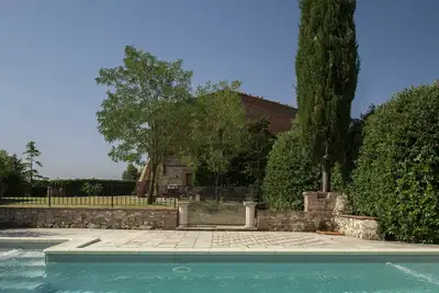 Image de Ferme pour 8 personnes avec piscine à Asciano et près de Sienne