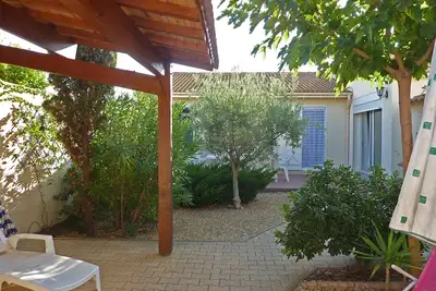 Image de Maison spacieuse jardin coquet calme et détente à 400m de la plage WiFi