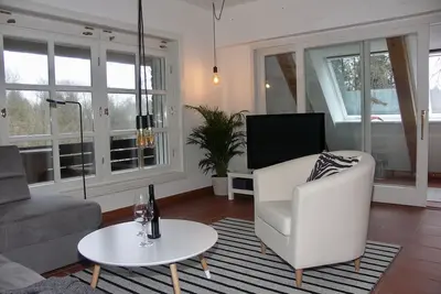 Image de Charmant, spacieux **** appartement 4 étoiles au milieu de la forêt