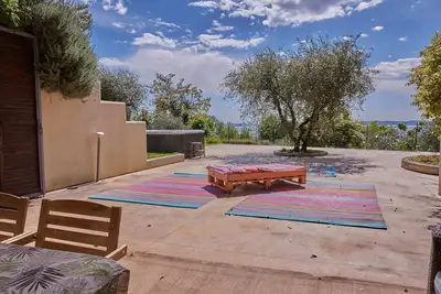 Image de Appartement avec une vue panoramique sur le lac de Garde