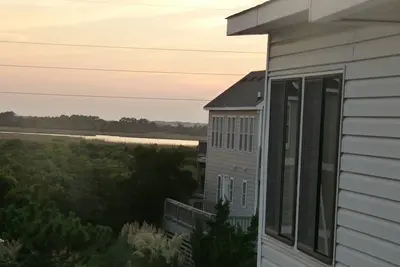 Image de Maison de plage bien entretenue, confortable et bien située pour 8 personnes, prend deux chiens.