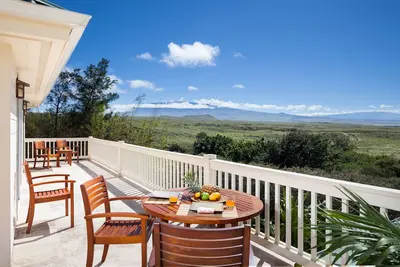 Image de Vue panoramique sur l'île et l'océan depuis nos suites magnifiquement élégantes et spacieuses