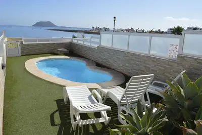 Image de Villa en bord de mer avec piscine privée
