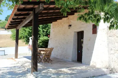 Image de Charmant trullo rénové avec piscine privée chauffée et Internet haut débit