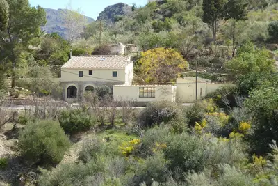 Image de Romantique moulin restauré avec piscine dans des jardins privés. Wifi gratuit.