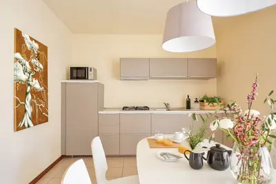 Image de Appartement de trois pièces 7 chambres jardin garage Gardasee wifi