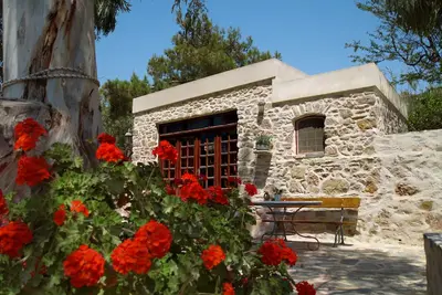 Image de Stone-built studio under two Eucalyptus trees.