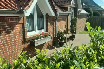 Image de Location dans la ville de fleurs Wiesmoor direckt sur Canal Nordgeorgsfehn