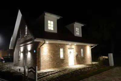 Image de Maison décernée par Dtv *****, près de la plage, cheminée, sauna, bain à remous, climatisation