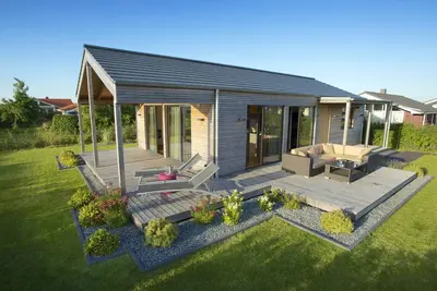 Image de Maison de vacances au design exclusif faite de matériaux naturels sains avec un équipement de pointe