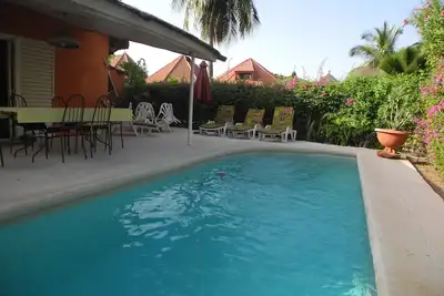 Image de Charmante villa piscine privee( resi. Safari) 100m plage privee tt confort