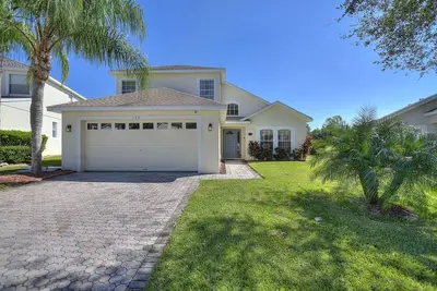 Image de Villa avec vue sur un golf! 25 minutes pour chauffer la piscine Disney inclus dans le devis