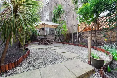 Image de Appartement de 3 chambres avec jardin traditionnel. Familles.