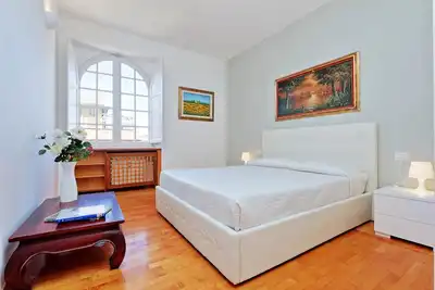 Image de Rome Colisée Location de vacances - Appartement spacieux Rome antique 3br / 2b Wi-Fi