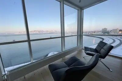 Image de Appartement de luxe au centre de Reykjavik avec une vue imprenable sur la ville.