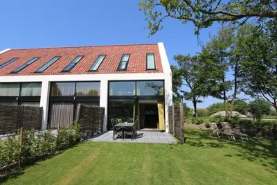 Image de Duinhuis 11 Villa de vacances moderne directement sur les dunes de la mer du Nord