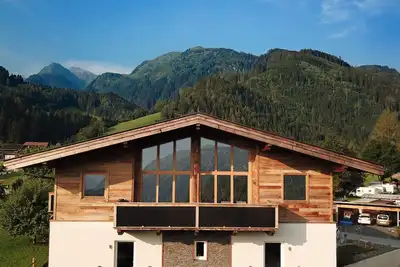Image de Spectaculaire penthouse de 110m2 avec sauna dans le domaine skiable de KitzbĂĽhel