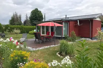 Image de Maison en bois avec grand jardin et sauna \"chiens bienvenus\"