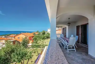 Image de Appartement de trois chambres avec la terrasse et la vue sur le mer Novi Vinodolski (A-15946-a)