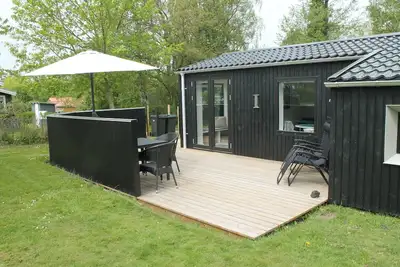 Maison confortable avec grande terrasse