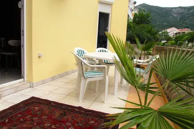 Image de Appartement de plage lumineux et frais - Séjournez 6 nuits et obtenez le 7 la nuit gratuite