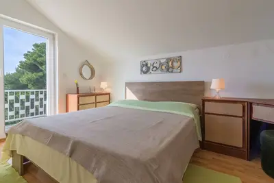 Image de Appartement pour 4 personnes près de la plage à Biograd, joli jardin meublé de façon moderne