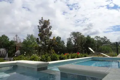 Image de Reunion Resort Golf Maison de vacances | 10 min de Disney | Piscine & Spa.