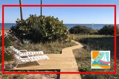 Image de Cosy Casas de la Playa Bajos (en bas) avec une vue magnifique sur l'océan