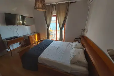 Image de Garçonnière avec le balcon et la vue sur le mer Posedarje, Novigrad (As-15786-b)