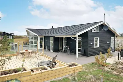 Image de Maison de vacances pour 8 a Løkken-By Traum