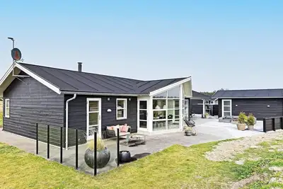 Image de Maison de vacances pour 8 a Løkken-By Traum