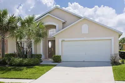 Image de 3 milles à Disney! Piscine, salle de jeux, WiFi, barbecue, * chaleur du spa Gratuite de mai à septembre *