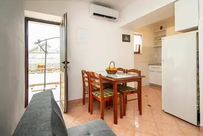Image de Joli appartement avec climatisation, Wifi, Tv, terrasse, animaux admis et parking