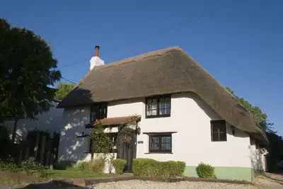 Image de Beau cottage et jardin. 5 min en voiture du parc Paultons, domicile de Peppa Pig