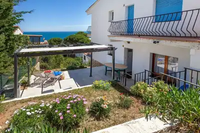 Image de Joli appartement pour 5 personnes avec Wifi, climatisation, Tv, terrasse et animaux admis