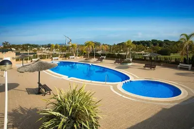 Image de Appartement avec piscine, Wifi, climatisation, Tv, terrasse, animaux admis, vue panoramique, parking