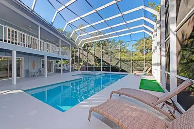 Image de Maison de plage spacieuse pour 13 personnes avec piscine chauffée privée et bain à remous