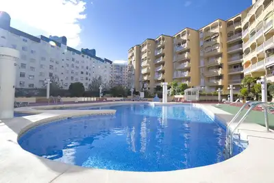 Image de Bel appartement avec climatisation, bain Ă remous, Wifi, piscine, Tv, terrasse, animaux admis