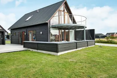Image de Maison de vacances pour 6 a Rømø-By Traum
