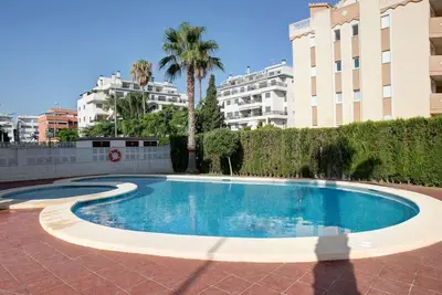 Image de Confortable appartement pour 4 personnes avec Wifi, climatisation, piscine, Tv et parking