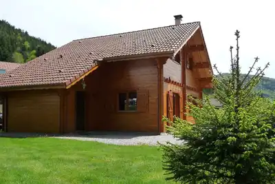 Image de Chalet Sauna, Jacuzzi, borne de charge voiture électrique à 2 min des pistes,