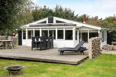 Image de Maison de vacances pour 8 a Løkken-By Traum