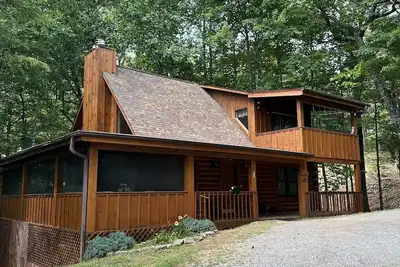 Image de Mtn. Voir cabane en rondins! 10 minutes de Pigeon Forge / Gatlinburg Jacuzzi, cheminée, Ps4