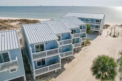 Image de Down By The Sea (E-4) - Adorable unité de 2 chambres en pi. Maisons mitoyennes Morgan avec vue magnifique sur le golfe et accès à la piscine!