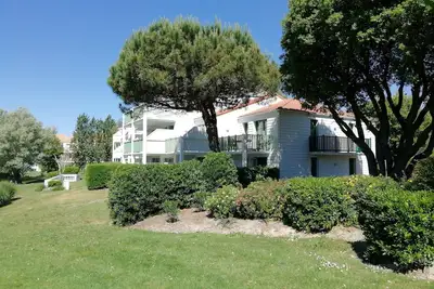 Image de Agréable lieu de vacances dans un golf au bord de l'Océan