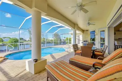 Image de Villa Starlight - Piscine chauffée, Spa / foyer 3b / 3ba / Den Elect chauffée, foyer, canal d’accès au golfe,