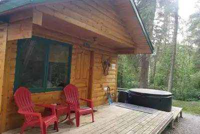 Image de Belle cabine avec bain à remous privé dans un cadre calme