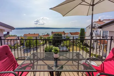 Image de Appartement de vacances avec air conditionné et vue sur la mer