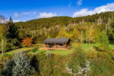 Image de Triple Tui - Cabane en rondins, autonome, côté rivière